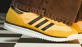 adidas Originals SL 72 RS sneakers in yellow Now $75.00. Was $100.00. (-25%)Now $75.00 Was $100.00(-25%)