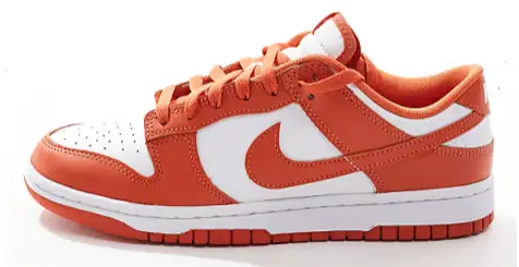 Nike Dunk Low Retro sneakers in white and orange Now $80.50. Was $115.00. (-30%)Now $80.50 Was $115.00(-30%)