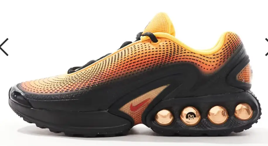 Nike Air Max DN sneakers in orange and black Now $102.00. Was $170.00. (-40%)Now $102.00 Was $170.00(-40%)