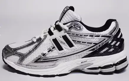 New Balance 1906 sneakers in white with black and silver details $154.99$154.99